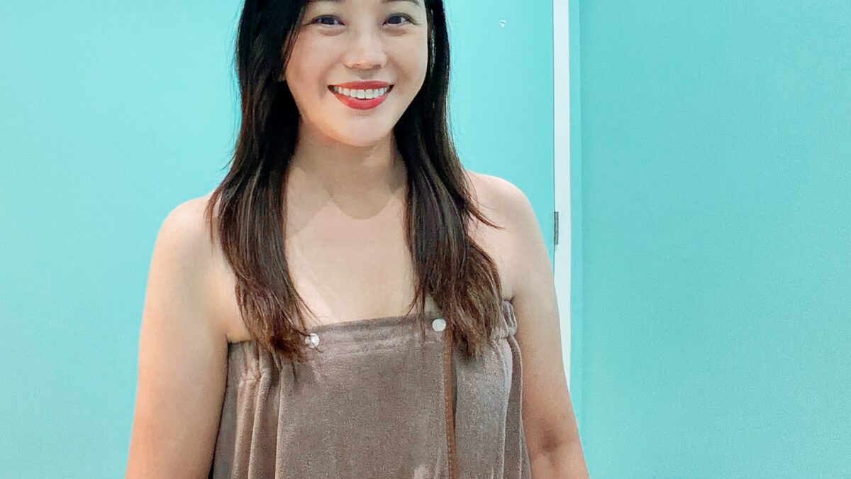 Client preparing for facial treatment at Melange Korea Gardens Mall