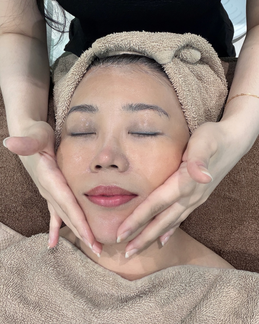 Facial massage treatment at Melange Korea Gardens Mall improving circulation and skin absorption
